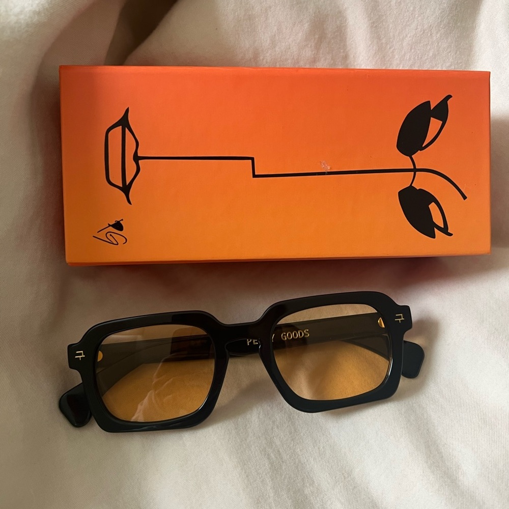 Peggy Gou PG04 black frames with orange lense